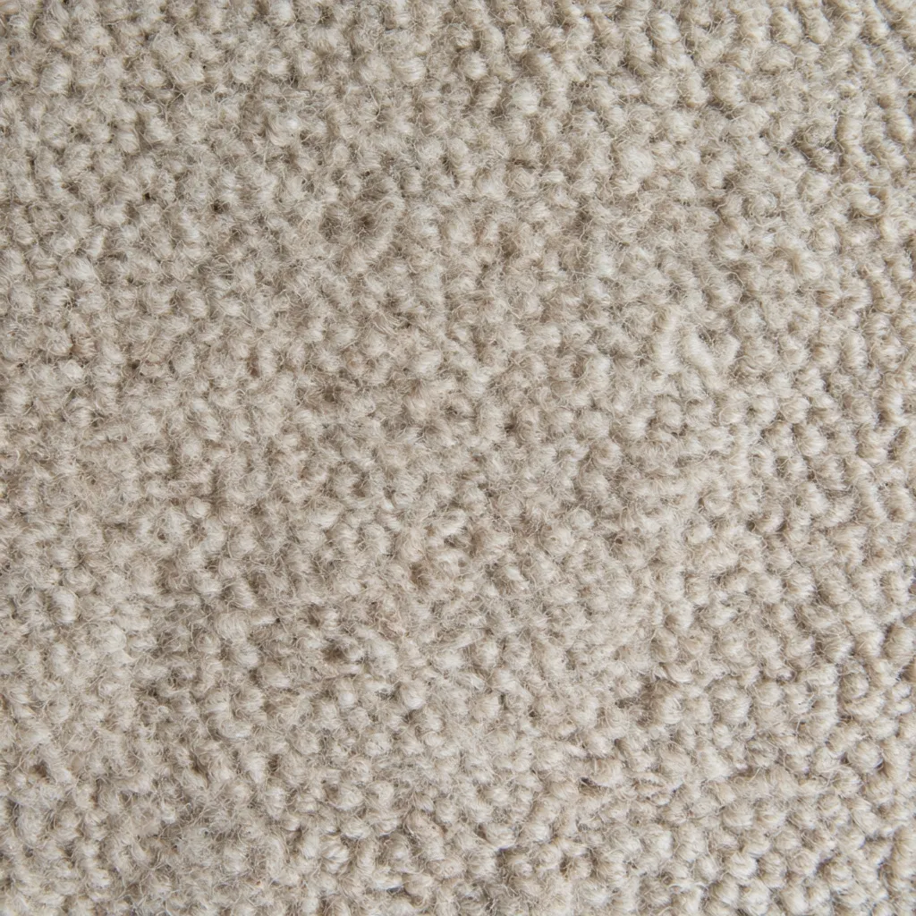 Close-up of oatmeal-colored wool bouclé fabric with a looped texture.